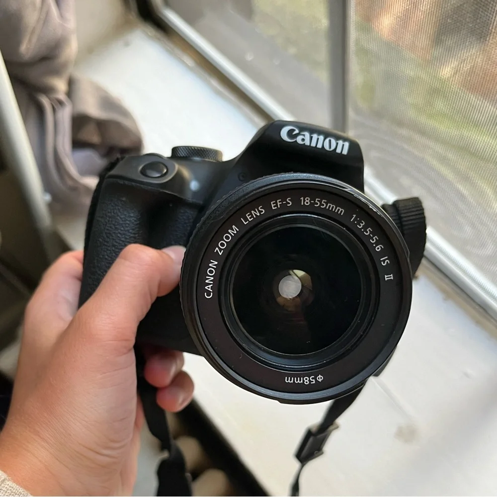 Canon Camera with case, charger, zoom lens and SD card to Apple converter
